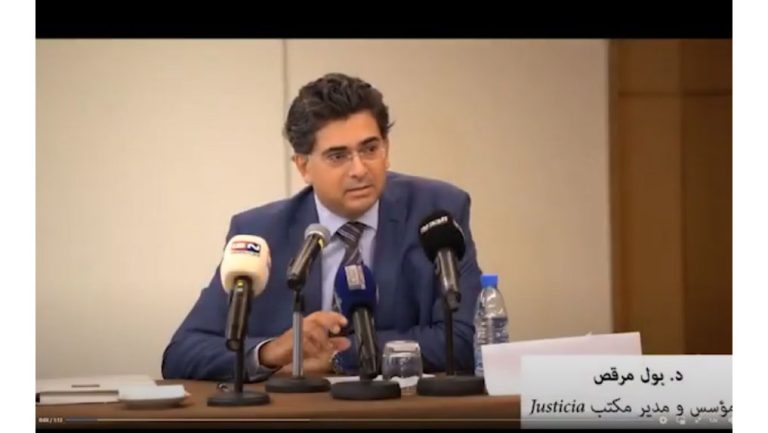 Dr  Paul Morcos explaining the criteria of proposed quota law #Justicia